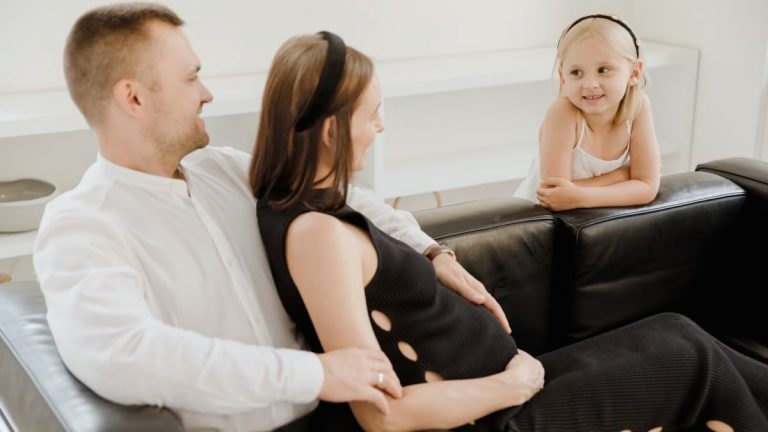 A loving family shares a tender moment, embracing joy and connection.