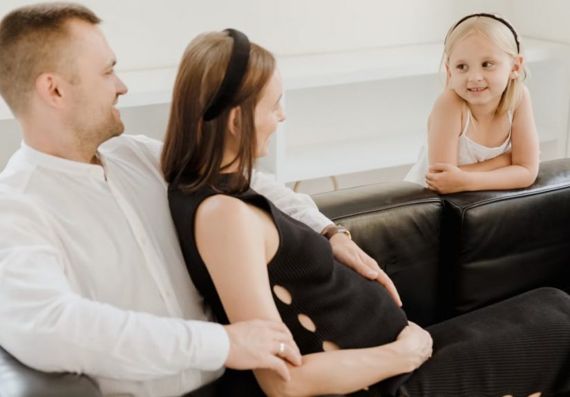 A loving family shares a tender moment, embracing joy and connection.